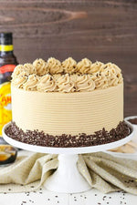 choco Chip cake with chocolate chips and beige frosting as a sweet treat by Cake Gurus Ruaka Nairobi with deliveries in Nairobi and its environs
