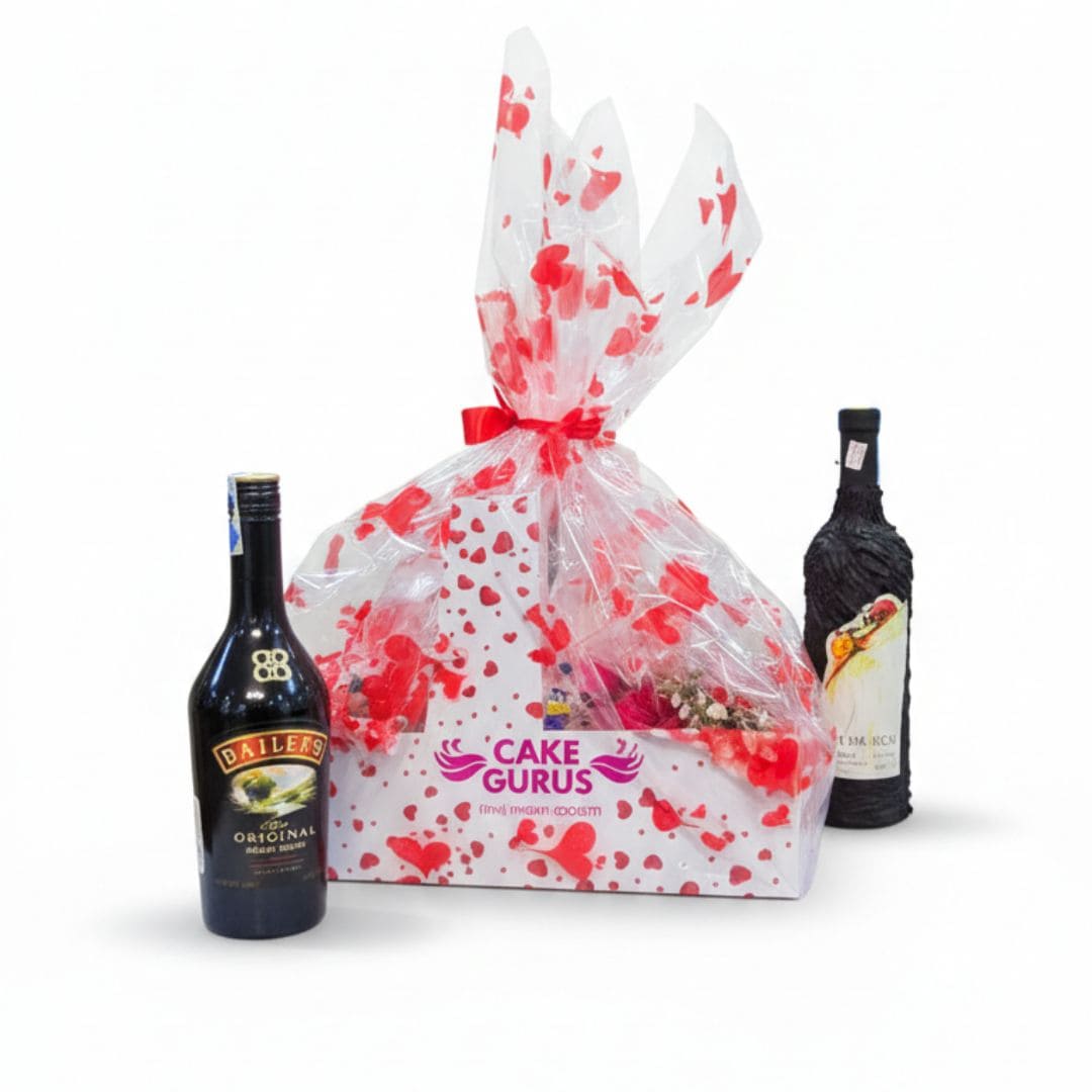 Two bottles of wine with a decorative gift bag filled with chocolates and sweets as a Valentines gifts nairobi ruaka 2026, delivery within ruaka nairobi and its environs.