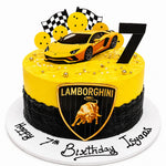 A custom 7th birthday cake decorated with a yellow Lamborghini sports car topper, a black number 7 topper, checkered flags, and the Lamborghini shield logo on the front. The cake is yellow and black with gold accents, sitting on a white cake board with 'Happy 7th Birthday Isyana' written in icing. 1.5kg decorated choconilla chocolate vanilla cake from Cake Gurus Ruaka