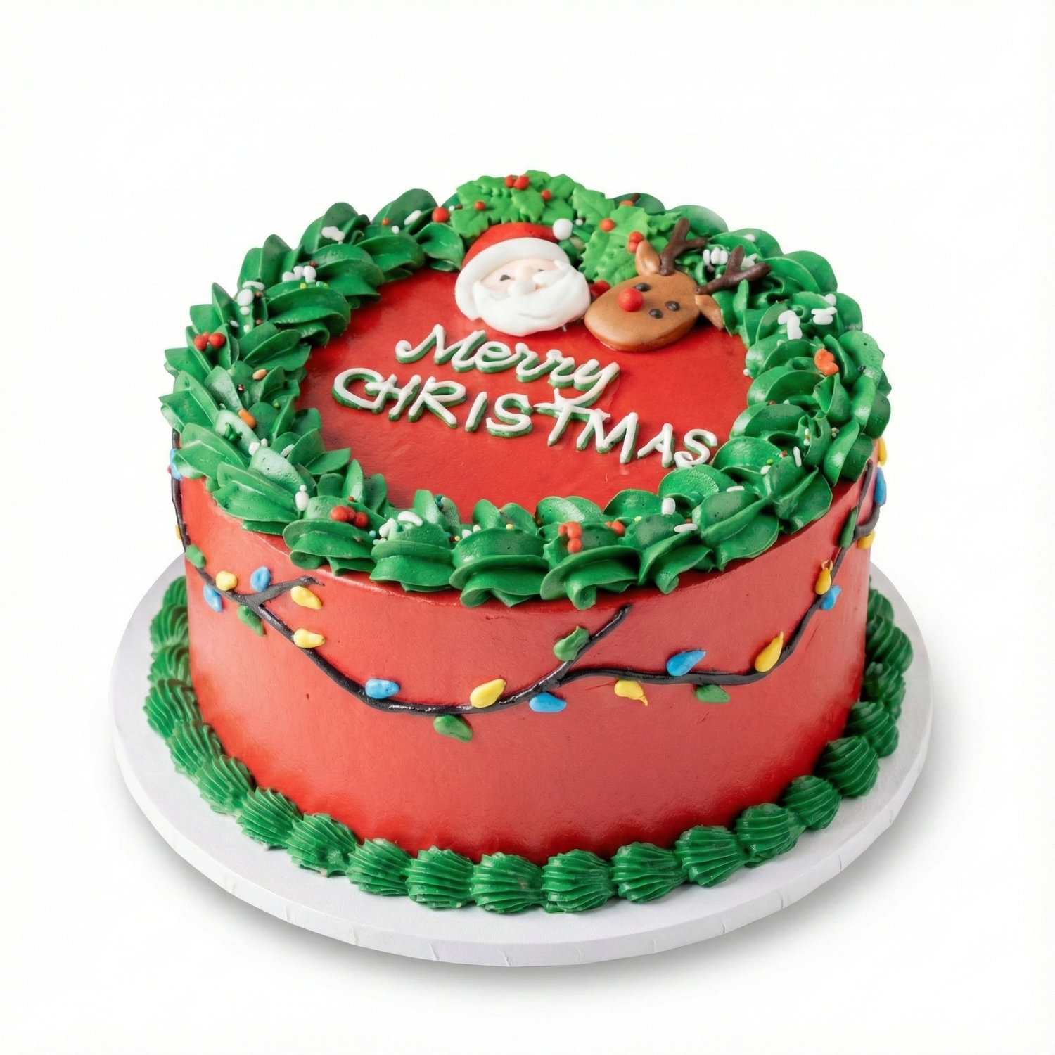 Christmas themed cake with red and green frosting, Santa face, and decorative lights on a white background.