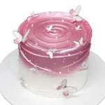 1.5kg Marble Orange birthday cake with personalised topper and elegant decoration by Cake Gurus in Ruaka, Kenya