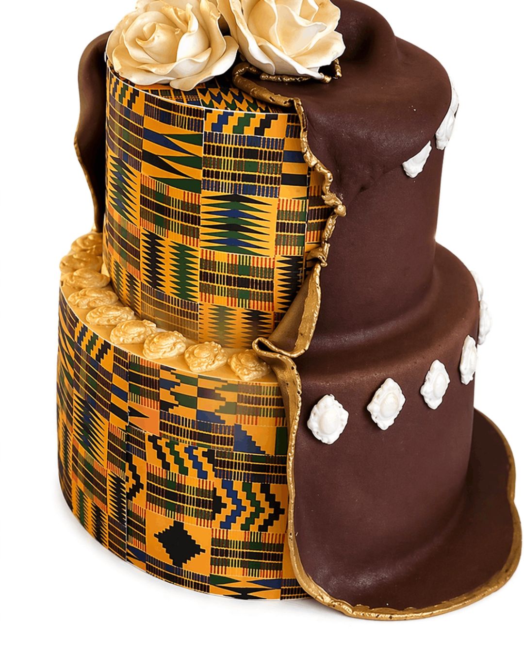 Three-tiered cake with Kente cloth design and chocolate icing on a white background