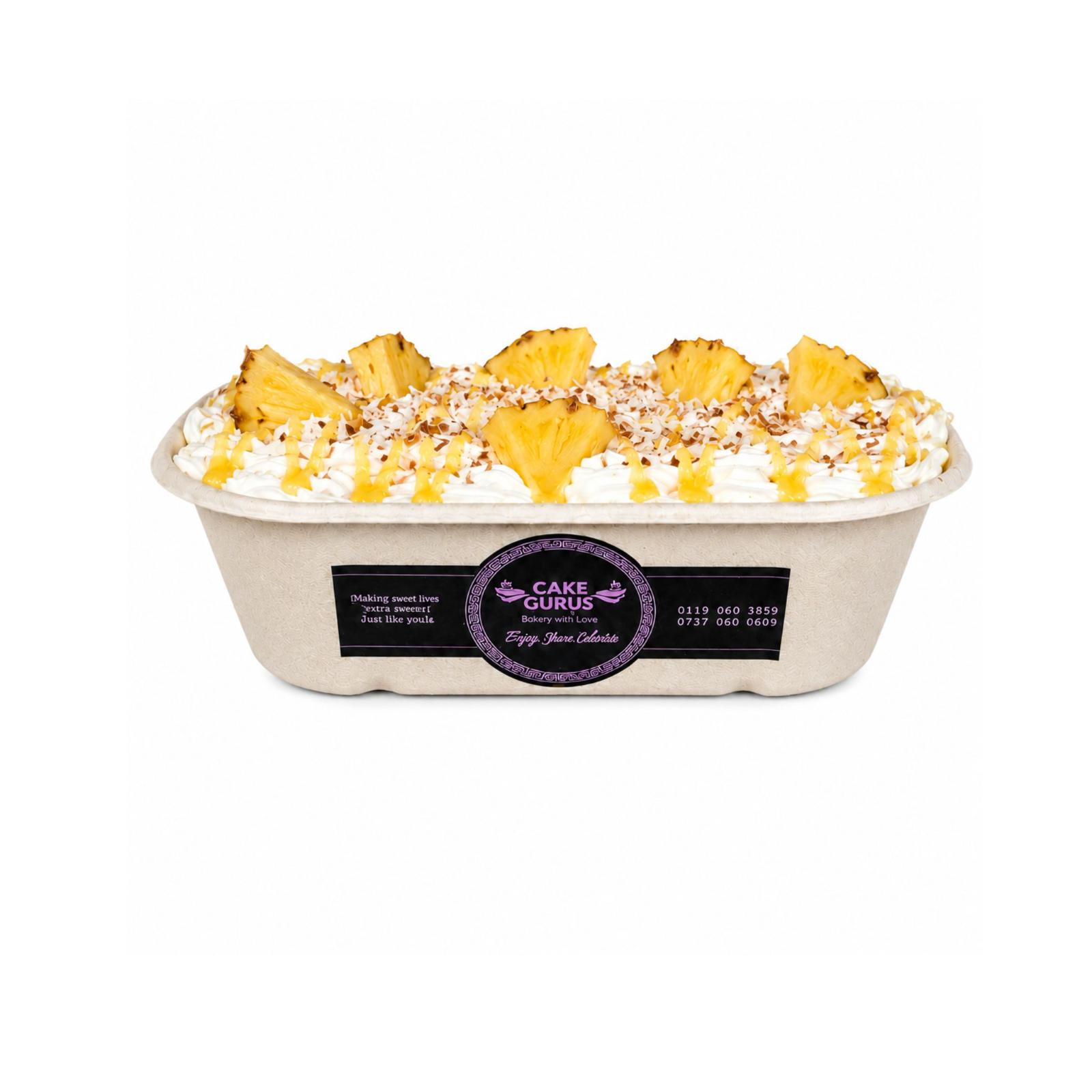 Cocktail-inspired 1000ml Pina Colada cake bowl with pineapple and coconut cream, a unique dessert from Cake Gurus Ruaka